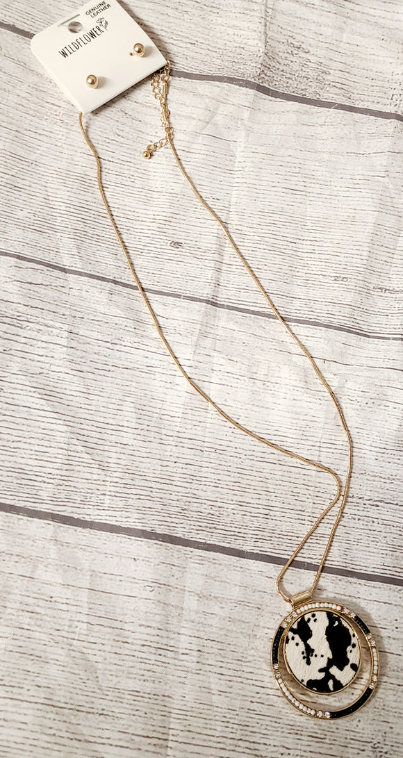 hair on hide gold colored necklace