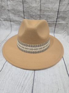 tan fashion hat with white band