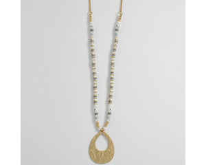 hammered gold textured with white crystal necklace