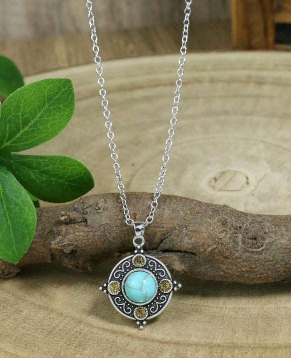 teal colored stone necklace with rhinestone