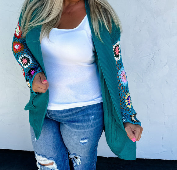 teal crocheted cardigan