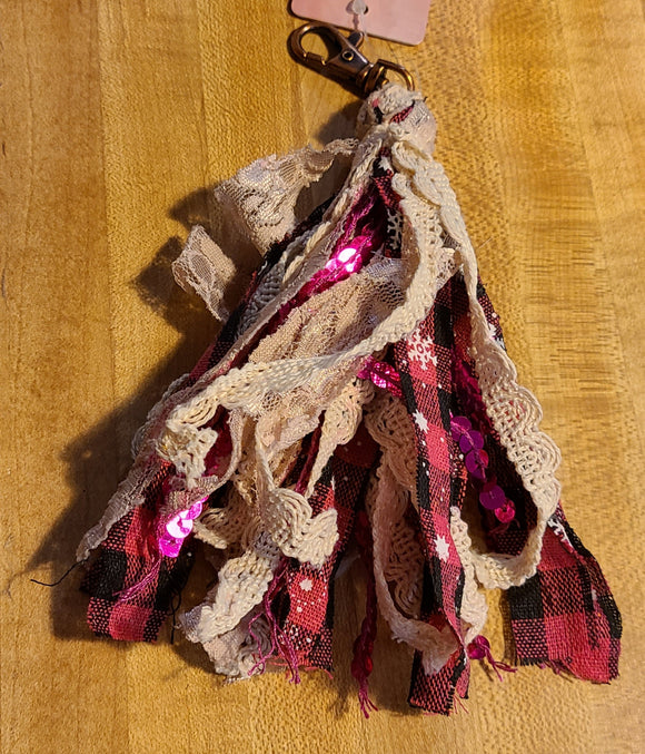 pink with snowflake tassle