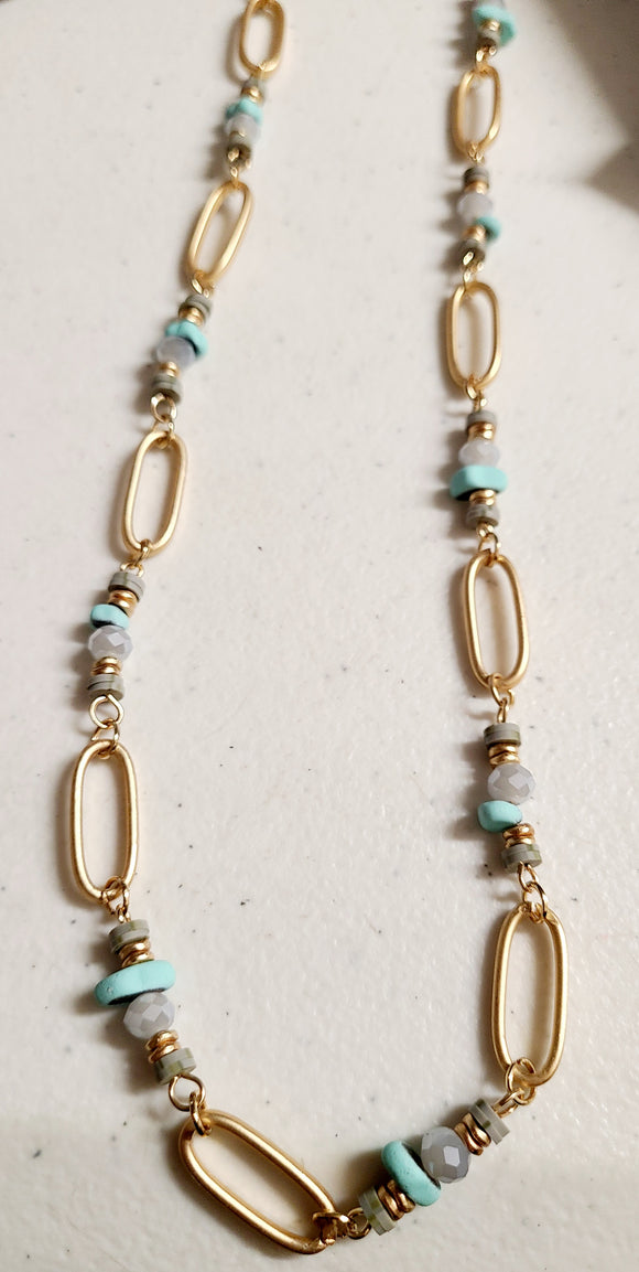 xtra long gold chain and blue stone necklace