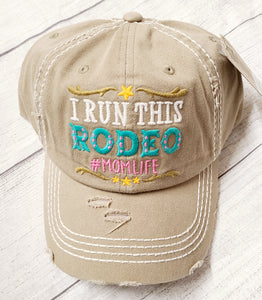 DISTRESSED TAN 'I RUN THIS RODEO #MOMLIFE' CAP *