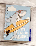 shark journal and pen