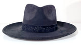 black fedora with flower band